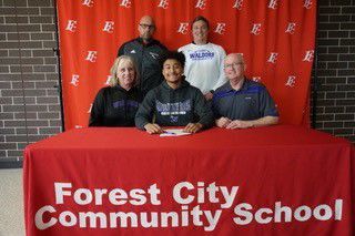 Michael Olson signs